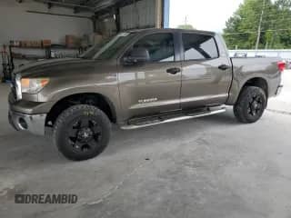 2011 Toyota Tundra with VIN 5TFDW5F17BX197031, listed as a Copart auction lot 59511085 with 157,076 mi miles and Salvage title. Bid and sale history available at DreamBid. Image 1.