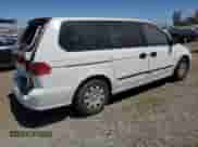 2000 Honda Odyssey LX с VIN 2HKRL1853YH501726, выставлен на аукционе Copart как лот 66131765 с пробегом 180 430 миль миль и Списание • Salvage title. История ставок и продаж доступна на DreamBid. Изображение 3.
