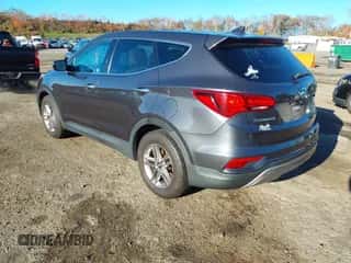 2017 Hyundai Santa Fe 2.4L z VIN 5XYZTDLB8HG457843, wystawiony jako IAAI lot #43507104 z przebiegiem 141 983 mil mil oraz . Historia ofert i sprzedaży dostępna na DreamBid. Obrazek 3.