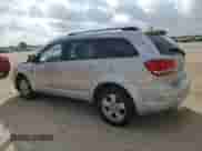 2012 Dodge Journey American Value with VIN 3C4PDCAB8CT184566, listed as a Copart auction lot 87305905 with 42,179 mi miles and Salvage title. Bid and sale history available at DreamBid. Image 2.