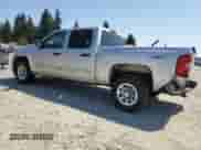 2010 Chevrolet Silverado 1500 LT with VIN 3GCRKSEAXAG210441, listed as a Copart auction lot 64805215 with 211,884 mi miles and Salvage title. Bid and sale history available at DreamBid. Image 2.