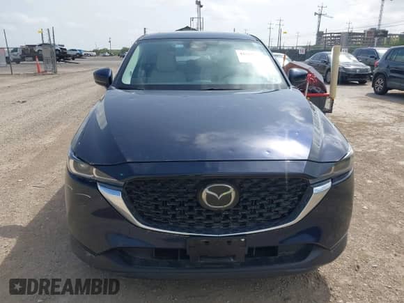 2023 Mazda CX-5 S Carbon Edition z VIN JM3KFBCM6P0165036, wystawiony jako IAAI lot #42622732 z przebiegiem 44 497 mil mil oraz . Historia ofert i sprzedaży dostępna na DreamBid. Obrazek 13.