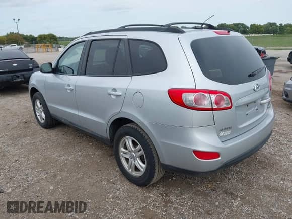 2010 Hyundai Santa Fe GLS z VIN 5NMSGDAB5AH335378, wystawiony jako IAAI lot #43158186 z przebiegiem 202 968 mil mil oraz . Historia ofert i sprzedaży dostępna na DreamBid. Obrazek 3.