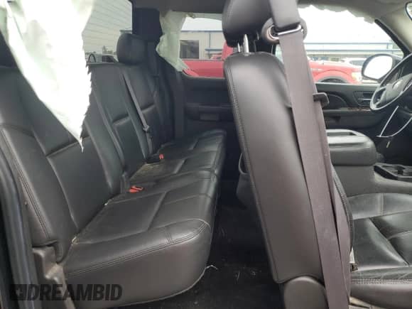 2011 Chevrolet Silverado 1500 LTZ z VIN 1GCRKTE3XBZ172556, wystawiony jako Copart lot #65977755 z przebiegiem Nie podano mil oraz Szkoda całkowita • Salvage title. Historia ofert i sprzedaży dostępna na DreamBid. Obrazek 10.