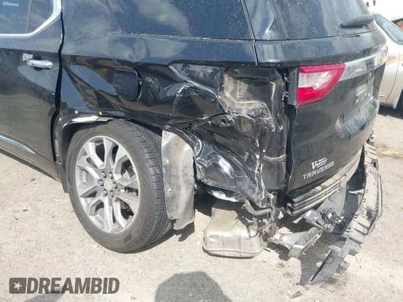 2020 Chevrolet Traverse Premier with VIN 1GNERKKW0LJ123828, listed as a IAAI auction lot 41947690 with 91,905 mi miles and . Bid and sale history available at DreamBid. Image 6.