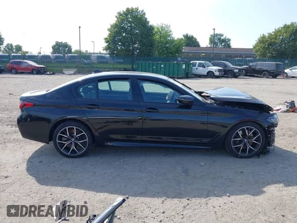 2021 BMW 5 Series 540i xDrive with VIN WBA73BJ05MWX34763, listed as a IAAI auction lot 42846623 with Not provided miles and . Bid and sale history available at DreamBid. Image 14.