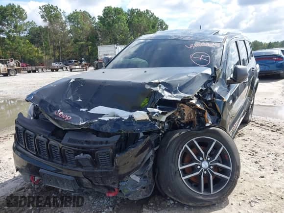 2017 Jeep Grand Cherokee Trailhawk z VIN 1C4RJFLT3HC678457, wystawiony jako IAAI lot #43140273 z przebiegiem 95 300 mil mil oraz . Historia ofert i sprzedaży dostępna na DreamBid. Obrazek 6.