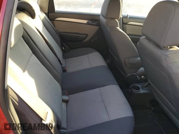 2011 Chevrolet Aveo LS z VIN KL1TD6DE6BB188130, wystawiony jako Copart lot #77906444 z przebiegiem 123 792 mil mil oraz Szkoda całkowita • Salvage title. Historia ofert i sprzedaży dostępna na DreamBid. Obrazek 10.