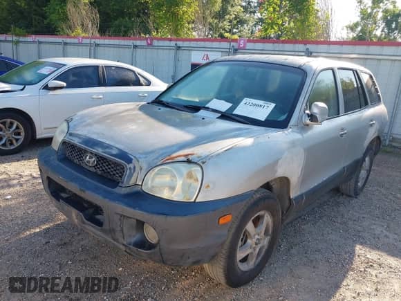 2003 Hyundai Santa Fe GLS z VIN KM8SC13E93U541750, wystawiony jako IAAI lot #42200817 z przebiegiem 174 842 mil mil oraz . Historia ofert i sprzedaży dostępna na DreamBid. Obrazek 6.