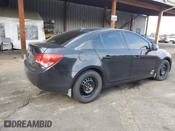 2013 Chevrolet Cruze LS с VIN 1G1PB5SH9D7271881, выставлен на аукционе Copart как лот 71675365 с пробегом 117 837 миль миль и Списание • Salvage title. История ставок и продаж доступна на DreamBid. Изображение 3.