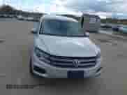 2014 Volkswagen Tiguan S with VIN WVGBV3AXXEW596502, listed as a IAAI auction lot 43538779 with 111,908 mi miles and . Bid and sale history available at DreamBid. Image 12.