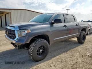 2020 Toyota Tundra SR5 with VIN 5TFDY5F17LX922980, listed as a Copart auction lot 67648185 with 77,147 mi miles and Salvage title. Bid and sale history available at DreamBid. Image 1.