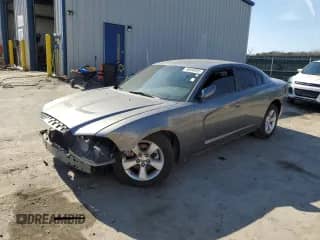 2012 Dodge Charger SE with VIN 2C3CDXBG4CH296441, listed as a Copart auction lot 60656525 with 192,186 mi miles and Salvage title. Bid and sale history available at DreamBid. Image 1.