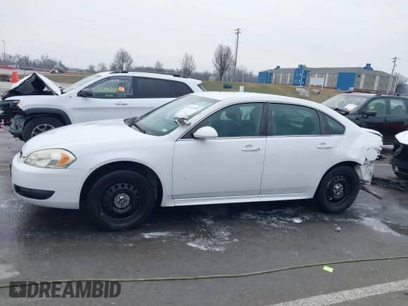 2013 Chevrolet Impala Police with VIN 2G1WD5E35D1222227, listed as a IAAI auction lot 41163786 with 176,742 mi miles and . Bid and sale history available at DreamBid. Image 14.