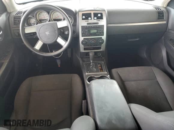 2009 Dodge Charger SXT с VIN 2B3KA33V79H514212, выставлен на аукционе Copart как лот 73103164 с пробегом 211 375 миль миль и Списание • Salvage title. История ставок и продаж доступна на DreamBid. Изображение 8.