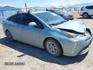 2021 Toyota Prius LE with VIN JTDL9MFU9M3023818, listed as a IAAI auction lot 42842899 with 99,876 mi miles and . Bid and sale history available at DreamBid. Image 1.
