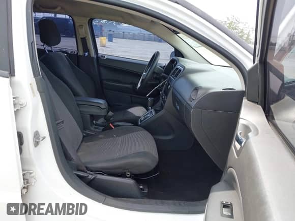 2011 Dodge Caliber Heat with VIN 1B3CB5HA8BD205483, listed as a IAAI auction lot 43289154 with 184,797 mi miles and . Bid and sale history available at DreamBid. Image 5.