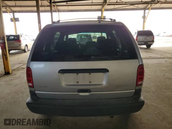 2000 Dodge Caravan with VIN 2B4GP25GXYR896821, listed as a Copart auction lot 58079985 with 217,327 mi miles and Salvage title. Bid and sale history available at DreamBid. Image 6.