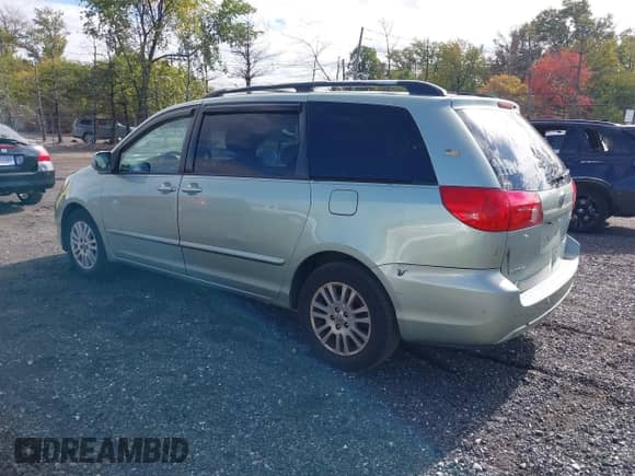 2009 Toyota Sienna XLE with VIN 5TDZK22C39S264912, listed as a IAAI auction lot 43385734 with 327,786 mi miles and . Bid and sale history available at DreamBid. Image 3.