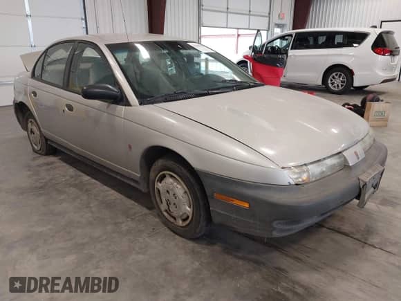 1999 Saturn SL with VIN 1G8ZF528XXZ362956, listed as a IAAI auction lot 42646763 with 201,548 mi miles and . Bid and sale history available at DreamBid. Image 1.