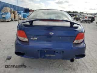 2001 Hyundai Tiburon с VIN KMHJG25F31U243512, выставлен на аукционе Copart как лот 44517465 с пробегом 49 540 миль миль и Списание • Salvage title. История ставок и продаж доступна на DreamBid. Изображение 6.