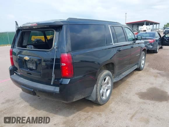 2018 Chevrolet Suburban LT z VIN 1GNSKHKC8JR357889, wystawiony jako IAAI lot #42908875 z przebiegiem 160 473 mil mil oraz . Historia ofert i sprzedaży dostępna na DreamBid. Obrazek 4.