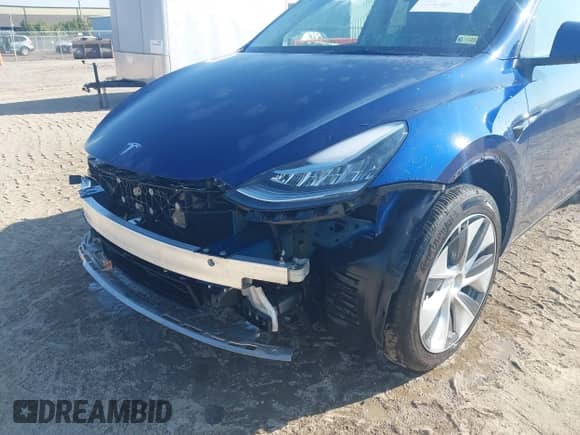 2023 Tesla Model Y Long Range with VIN 7SAYGDEE4PA125024, listed as a IAAI auction lot 43252218 with 21,200 mi miles and . Bid and sale history available at DreamBid. Image 6.