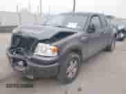 2006 Ford F-150 STX with VIN 1FTRX02WX6KB71470, listed as a IAAI auction lot 41402316 with 168,323 mi miles and . Bid and sale history available at DreamBid. Image 2.