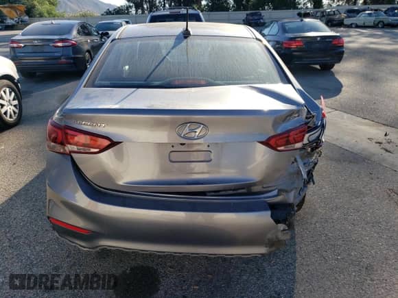 2018 Hyundai Accent Limited с VIN 3KPC34A33JE031594, выставлен на аукционе Copart как лот 87111345 с пробегом 63 454 миль миль и Списание • Salvage title. История ставок и продаж доступна на DreamBid. Изображение 6.