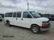 2017 Chevrolet Express Passenger LT with VIN 1GAZGPFG7H1334282, listed as a Copart auction lot 65460165 with 114,603 mi miles and Clean title. Bid and sale history available at DreamBid. Image 4.