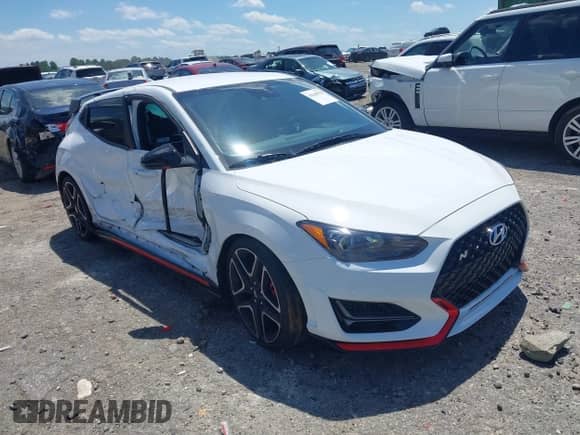 2022 Hyundai Veloster z VIN KMHT36AH3NU014434, wystawiony jako IAAI lot #42540378 z przebiegiem 28 106 mil mil oraz . Historia ofert i sprzedaży dostępna na DreamBid. Obrazek 1.