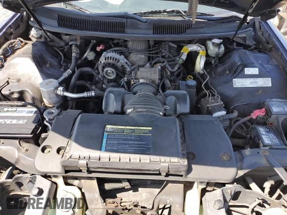 2000 Chevrolet Camaro z VIN 2G1FP22K0Y2172094, wystawiony jako Copart lot #68943135 z przebiegiem 157 026 mil mil oraz Czysty tytuł • Clean title. Historia ofert i sprzedaży dostępna na DreamBid. Obrazek 11.