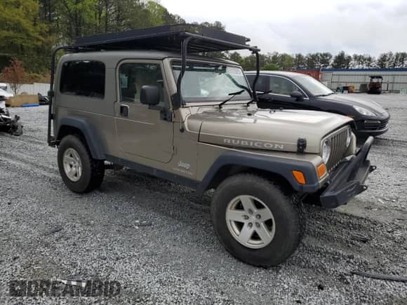 2006 Jeep Wrangler с VIN 1J4FA64S16P783345, выставлен на аукционе Copart как лот 51279815 с пробегом 160 368 миль миль и Списание • Salvage title. История ставок и продаж доступна на DreamBid. Изображение 4.