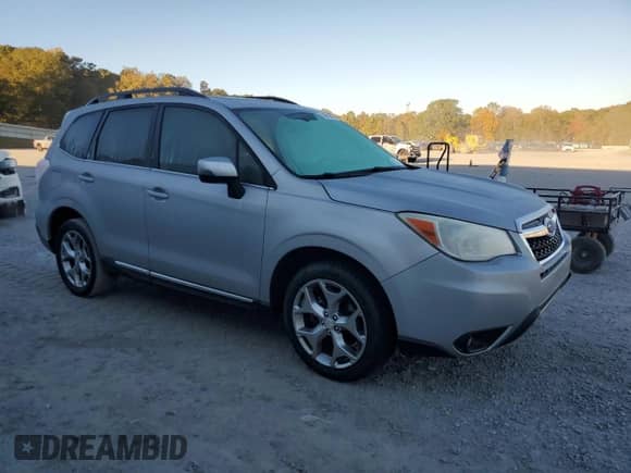 2015 Subaru Forester Touring with VIN JF2SJAUCXFH445146, listed as a Copart auction lot 82668345 with 211,918 mi miles and Clean title. Bid and sale history available at DreamBid. Image 4.