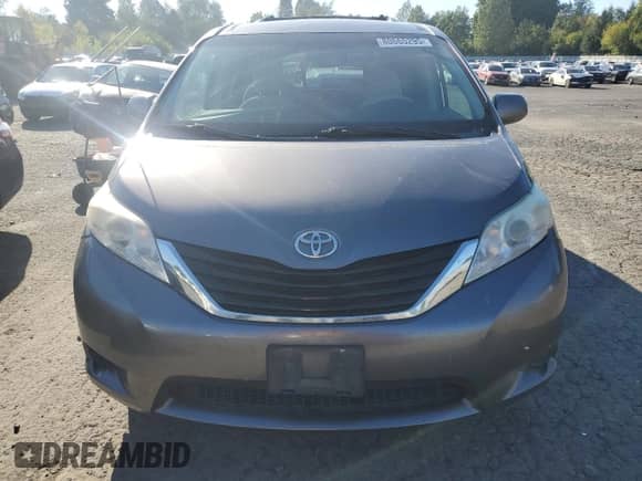 2011 Toyota Sienna LE with VIN 5TDKK3DC7BS121990, listed as a Copart auction lot 80665295 with 234,713 mi miles and Salvage title. Bid and sale history available at DreamBid. Image 5.