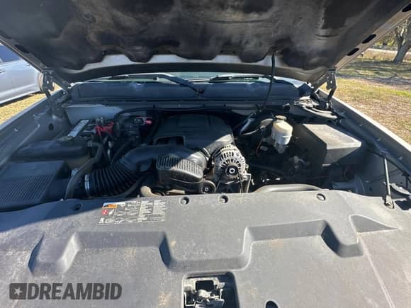 2013 Chevrolet Silverado 1500 LT z VIN 3GCPCSEA9DG215414, wystawiony jako Copart lot #83071594 z przebiegiem 230 791 mil mil oraz Czysty tytuł • Clean title. Historia ofert i sprzedaży dostępna na DreamBid. Obrazek 7.
