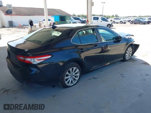 2020 Toyota Camry LE z VIN 4T1C11AK6LU378364, wystawiony jako IAAI lot #43218845 z przebiegiem 157 524 mil mil oraz . Historia ofert i sprzedaży dostępna na DreamBid. Obrazek 4.