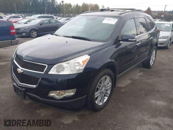 2012 Chevrolet Traverse 2LT with VIN 1GNKVJED7CJ325973, listed as a IAAI auction lot 43405773 with 145,472 mi miles and . Bid and sale history available at DreamBid. Image 2.