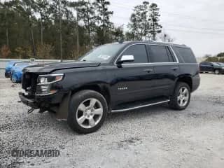 2019 Chevrolet Tahoe Premier с VIN 1GNSCCKC7KR171651, выставлен на аукционе Copart как лот 88310365 с пробегом 55 880 миль миль и Списание • Salvage title. История ставок и продаж доступна на DreamBid. Изображение 1.