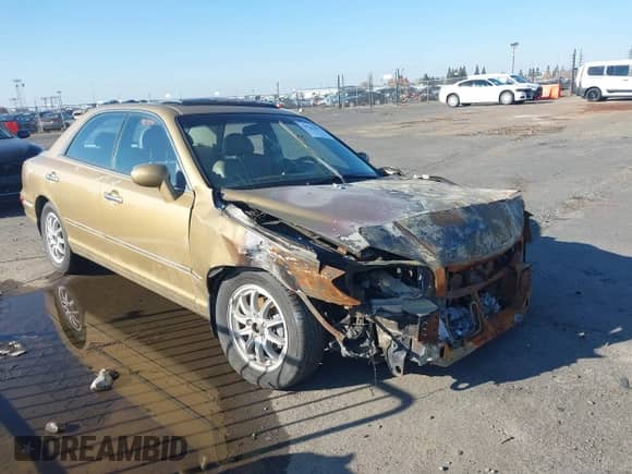 2002 Hyundai XG L z VIN KMHFU45E72A182461, wystawiony jako IAAI lot #38121671 z przebiegiem Nie podano mil oraz . Historia ofert i sprzedaży dostępna na DreamBid. Obrazek 1.