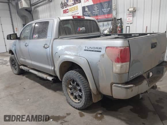 2013 Toyota Tundra Limited with VIN 5TFHW5F12DX289443, listed as a IAAI auction lot 42989623 with 195,739 mi miles and . Bid and sale history available at DreamBid. Image 3.