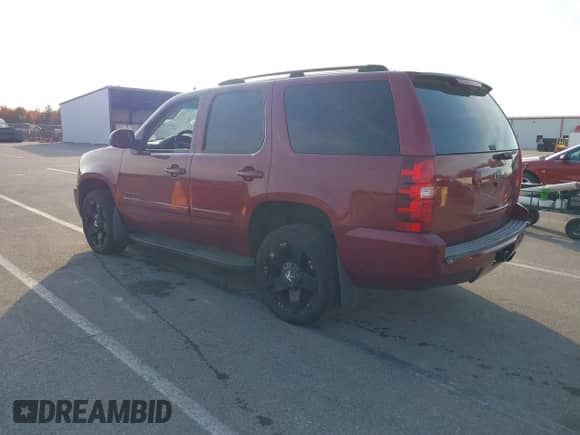 2007 Chevrolet Tahoe LS with VIN 1GNFK13077R184257, listed as a IAAI auction lot 40680593 with 206,234 mi miles and . Bid and sale history available at DreamBid. Image 3.