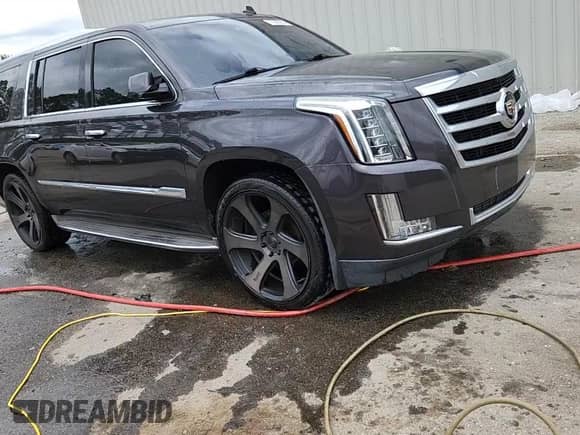 2015 Cadillac Escalade ESV Luxury с VIN 1GYS3HKJ4FR277575, выставлен на аукционе Copart как лот 70989265 с пробегом 231 225 миль миль и Списание • Salvage title. История ставок и продаж доступна на DreamBid. Изображение 14.