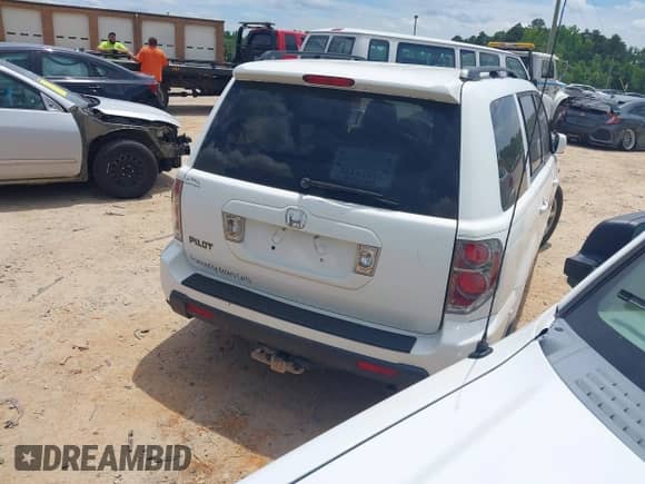 2007 Honda Pilot EX with VIN 5FNYF28477B011657, listed as a IAAI auction lot 42468364 with 263,983 mi miles and . Bid and sale history available at DreamBid. Image 4.