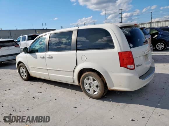 2011 Dodge Grand Caravan Express with VIN 2D4RN4DG8BR692835, listed as a Copart auction lot 83990675 with 276,587 mi miles and Salvage title. Bid and sale history available at DreamBid. Image 2.
