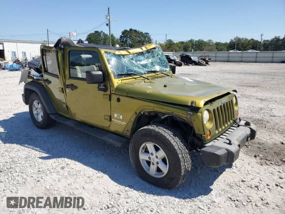 2007 Jeep Wrangler Unlimited X с VIN 1J4GB39107L118865, выставлен на аукционе Copart как лот 80206035 с пробегом 248 505 миль миль и Списание • Salvage title. История ставок и продаж доступна на DreamBid. Изображение 4.