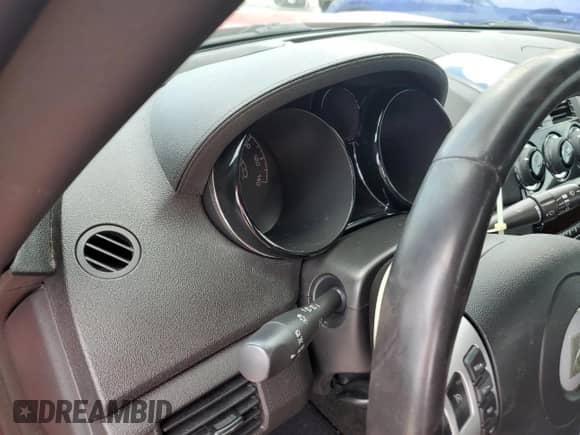 2009 Saturn Sky с VIN 1G8MN35B79Y103875, выставлен на аукционе Copart как лот 74669844 с пробегом Не указан миль и Списание • Salvage title. История ставок и продаж доступна на DreamBid. Изображение 9.