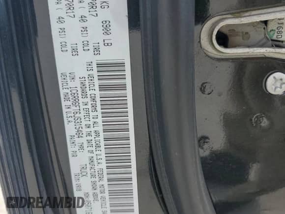 2018 Ram 1500 Tradesman with VIN 1C6RR6FT6JS315464, listed as a Copart auction lot 65948005 with Not provided miles and Salvage title. Bid and sale history available at DreamBid. Image 12.