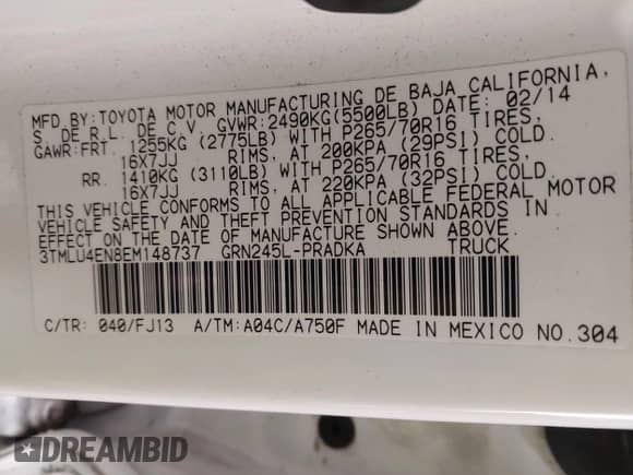 2014 Toyota Tacoma with VIN 3TMLU4EN8EM148737, listed as a IAAI auction lot 43256920 with 106,235 mi miles and . Bid and sale history available at DreamBid. Image 9.