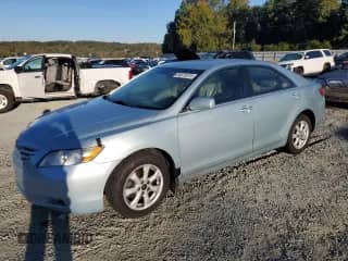 2007 Toyota Camry CE with VIN 4T1BE46KX7U713738, listed as a Copart auction lot 86875575 with 295,189 mi miles and Salvage title. Bid and sale history available at DreamBid. Image 1.